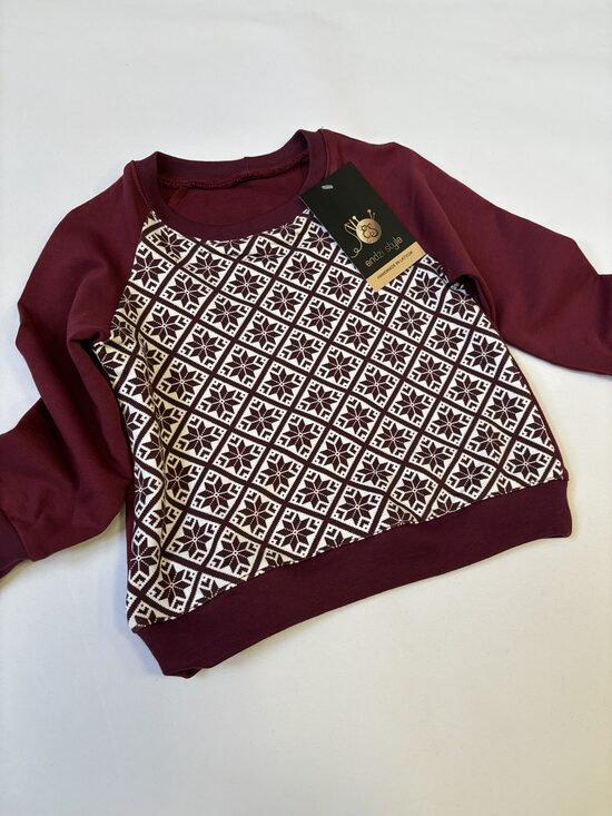 Bordo tonī džemperis bērniem ar rakstu auseklis. 62-98.izm.